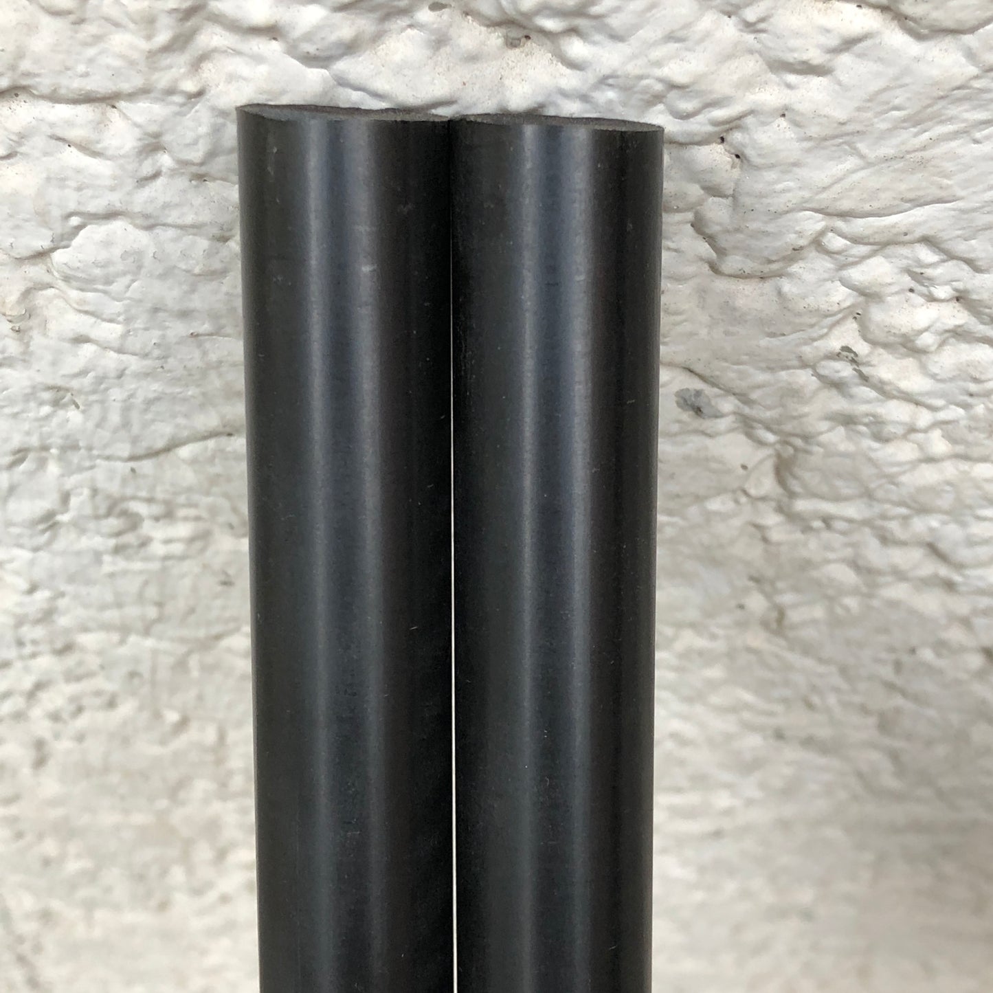 "PURE BLACK" POLISHED RODS which contains carbon black for non-discoloration